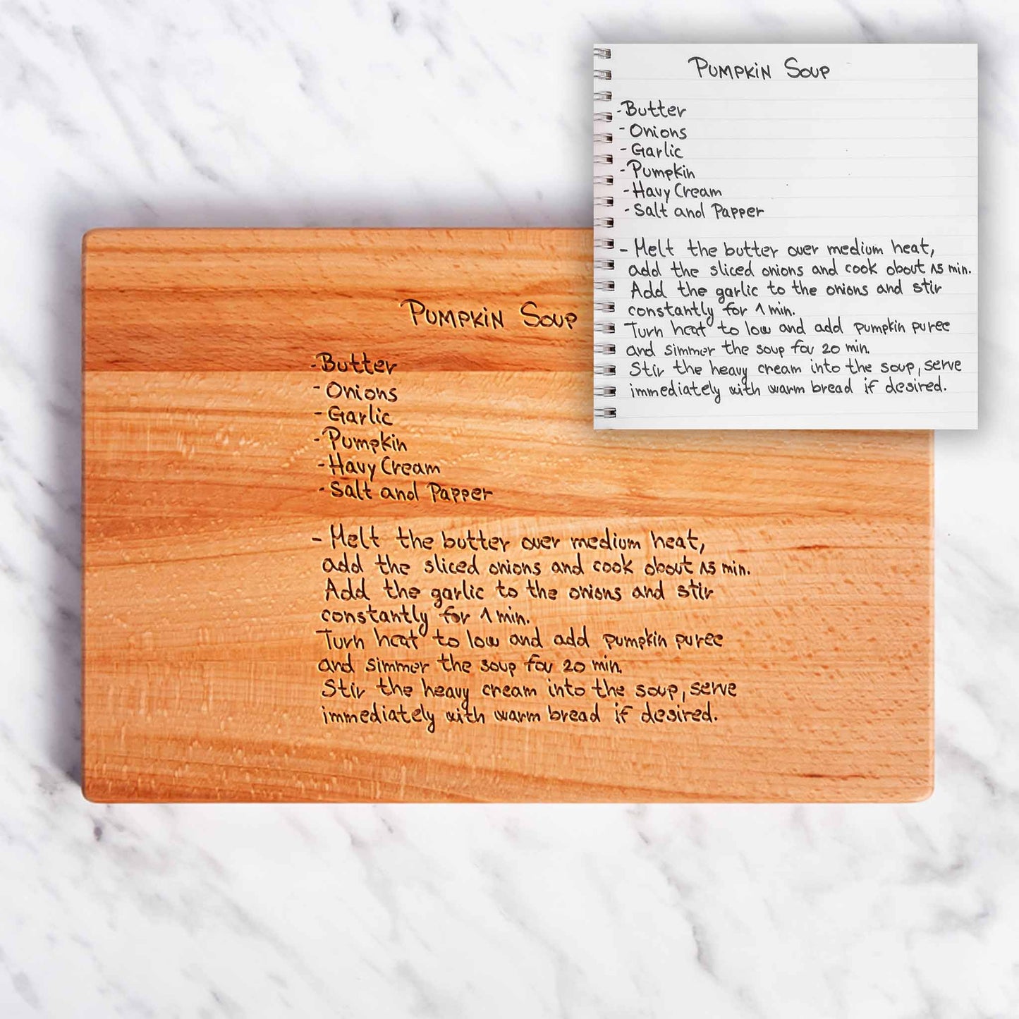 Wooden cutting board with engraved pumpkin soup recipe.