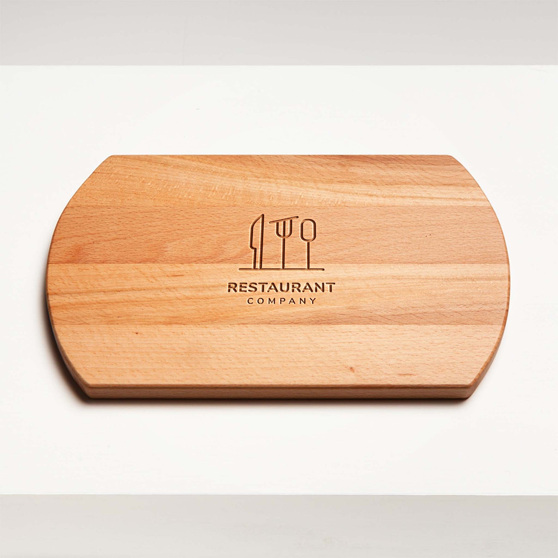 Wooden cutting board with 'Restaurant Company' logo on a white background