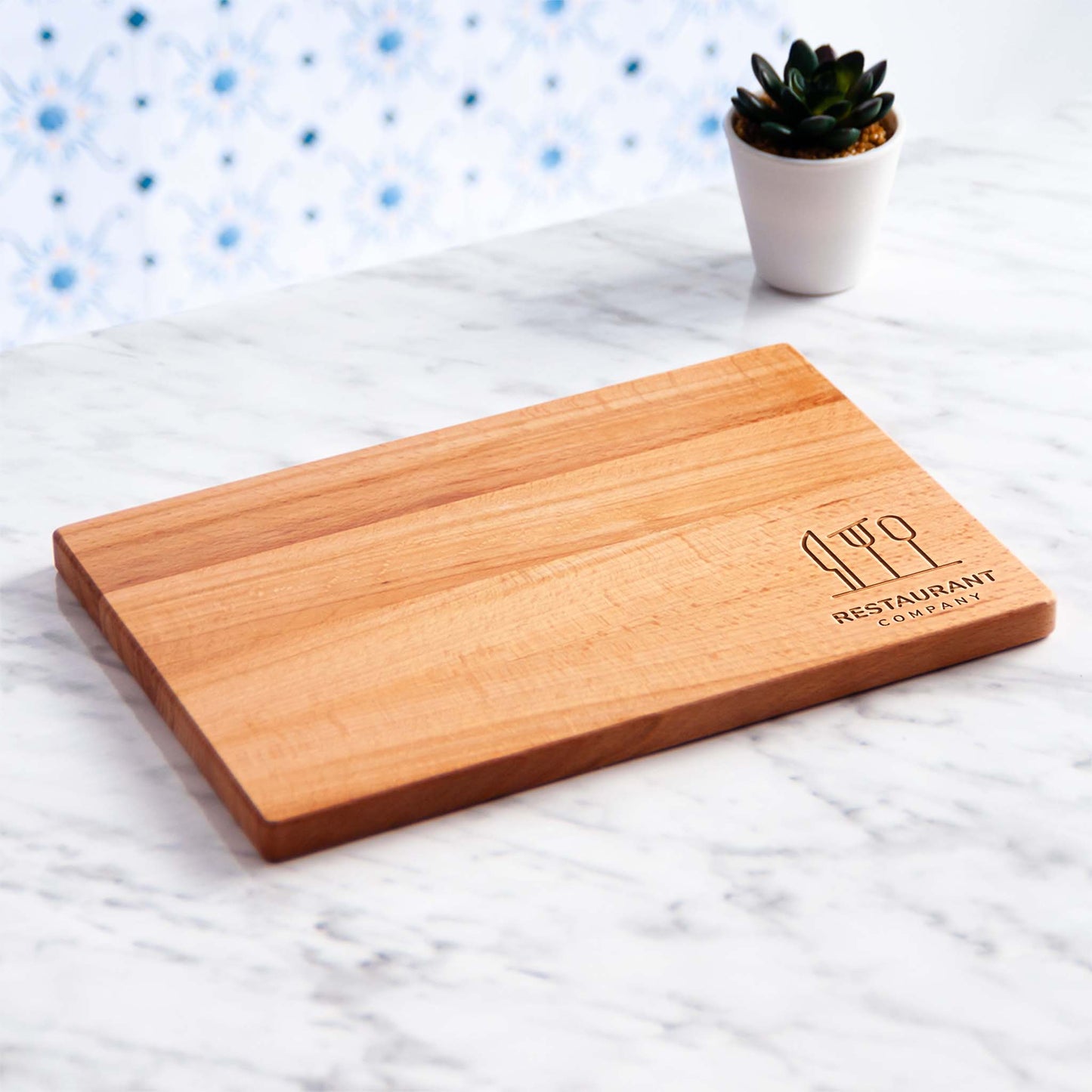 Beech wood cutting board used as charcuterie serving board in restaurant.