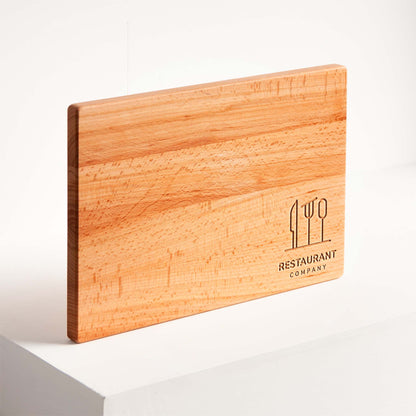 Wooden cutting board with 'Restaurant Company' logo on a white background