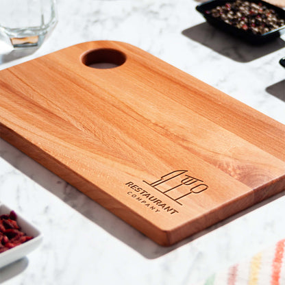 Large personalised beech chopping board - laser logo engraving close-up