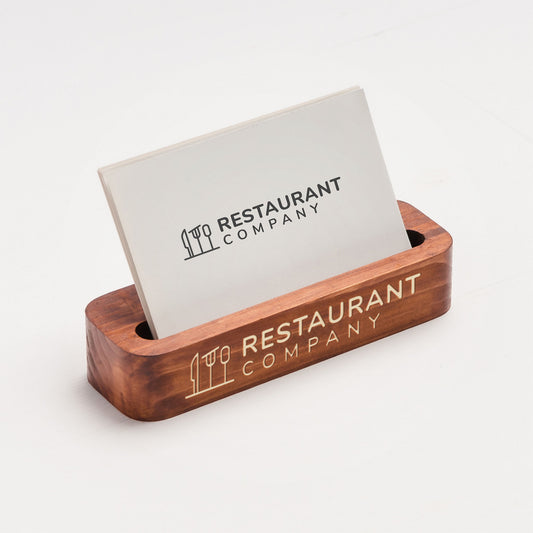 Wooden business card holder with 'Restaurant Company' branding on a white background