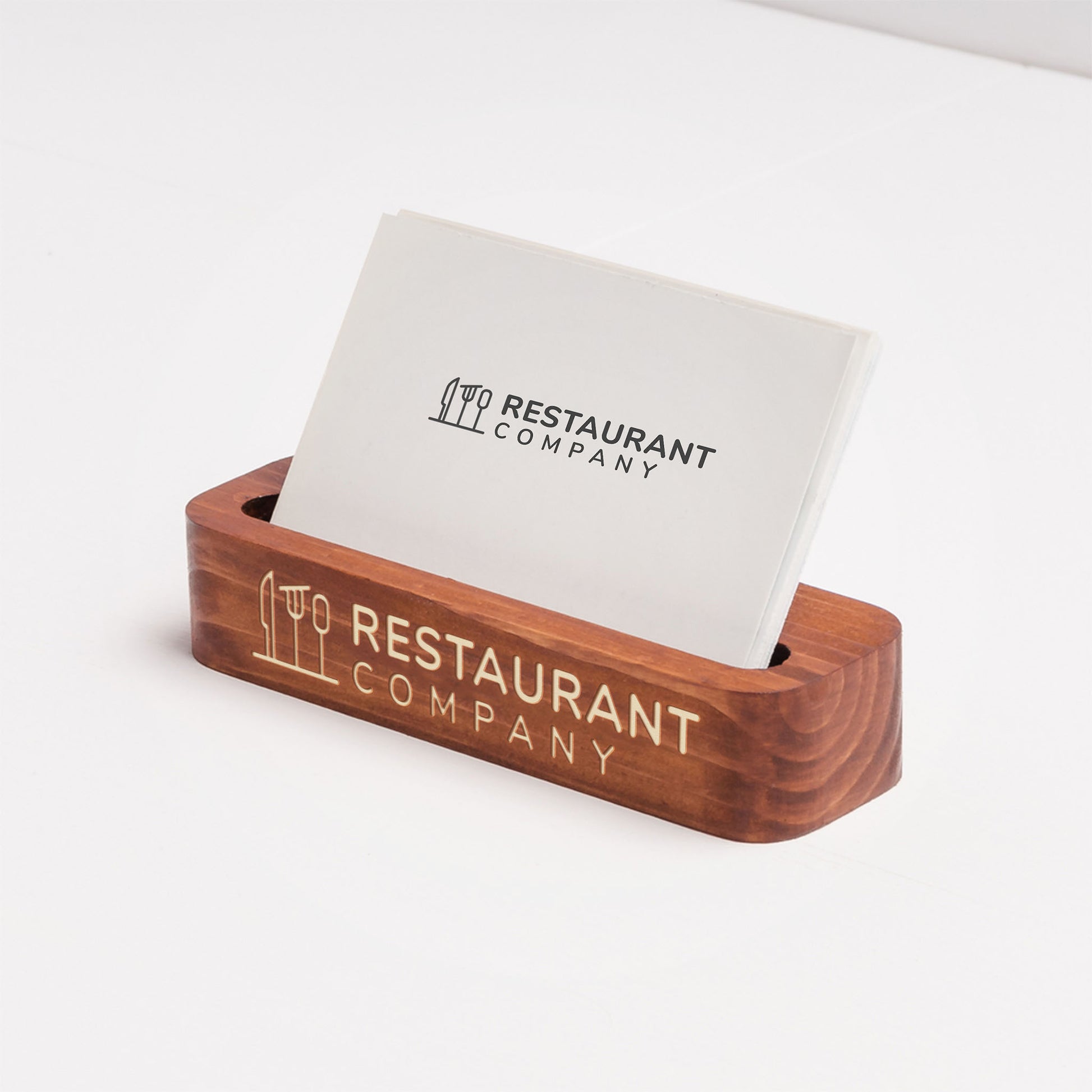 Wooden business card holder with 'Restaurant Company' branding on a white background