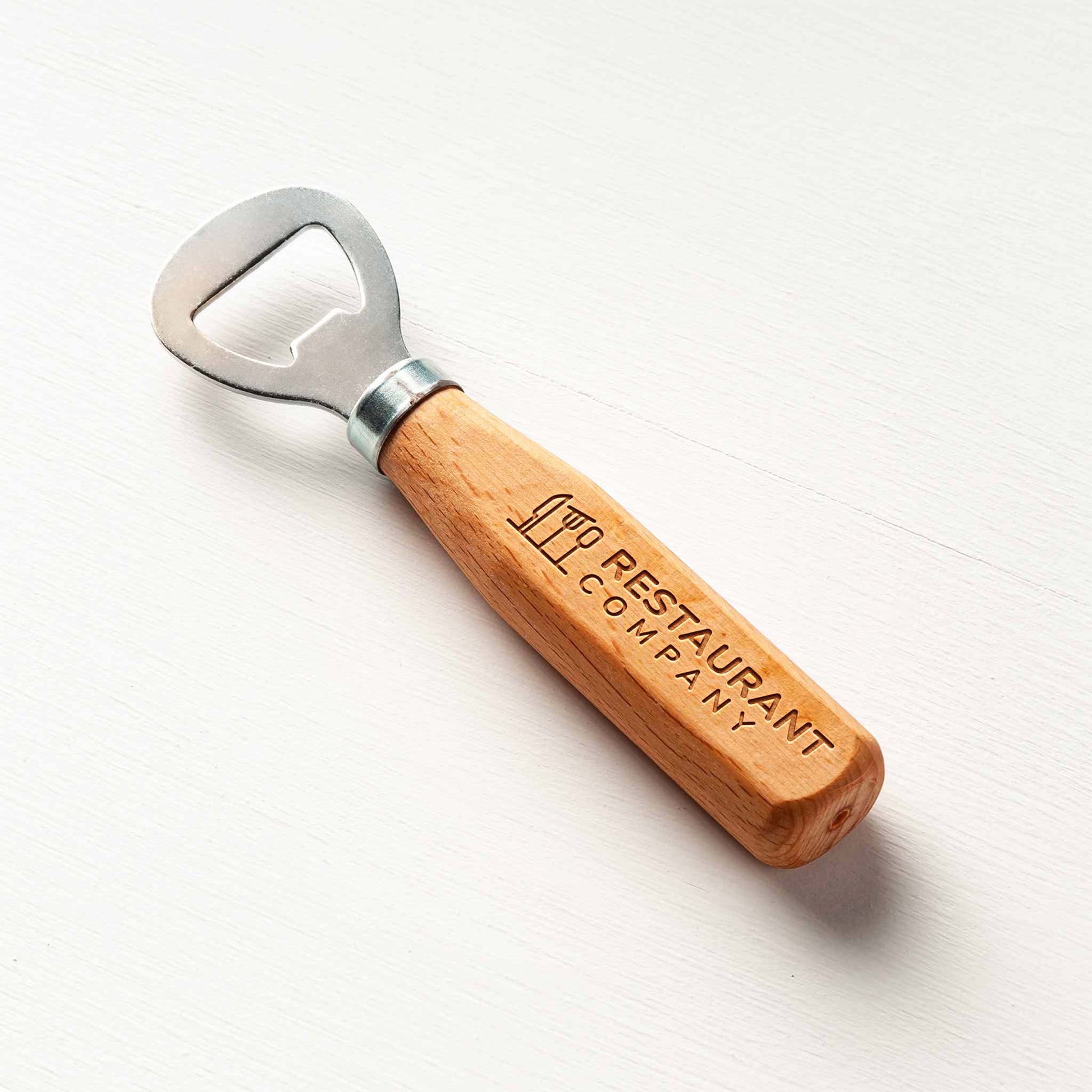 Wooden bottle opener with 'Restaurant Company' branding on a white background