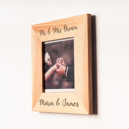 Customizable wooden picture frame with family photo.