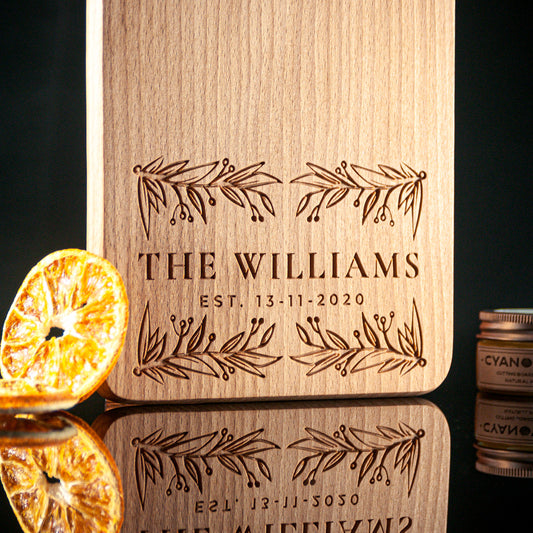 Cyanowood offers custom and personalized handmade wedding cheese boards made of beech wood with floral designs and branch engravings. Our organic charcuterie boards with handles make the perfect cheese platter and wooden serving board. Shop now for a unique and memorable wedding gift.