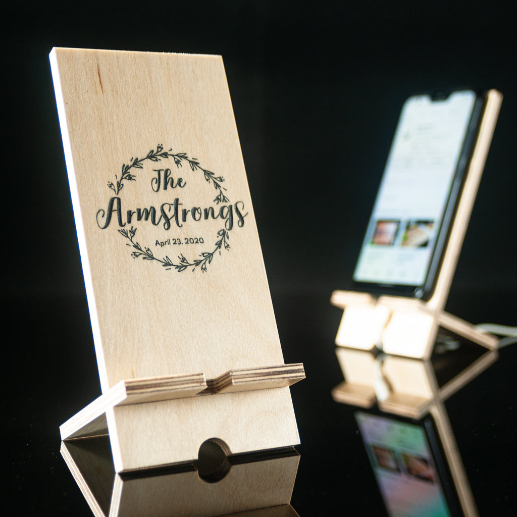 Personalized Wooden Phone Stand with Engraved Wreath Design