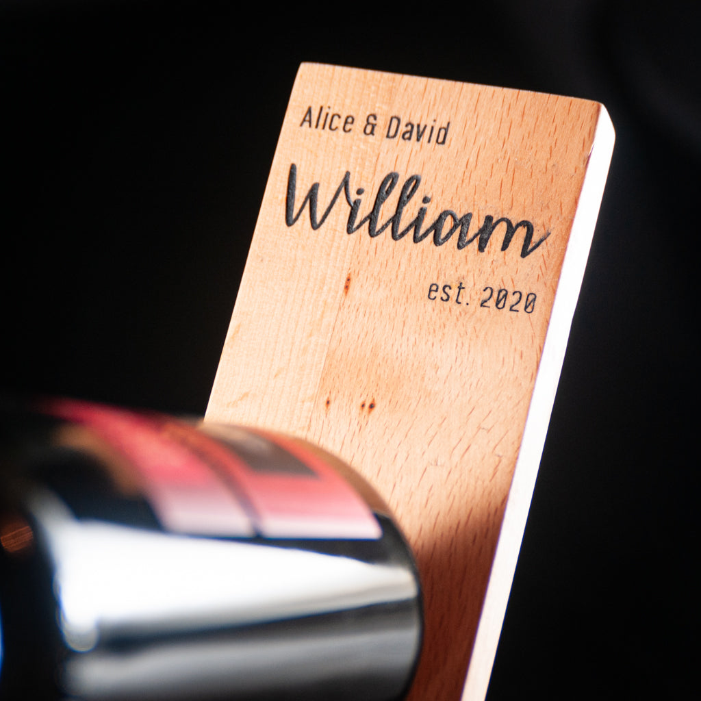 Personalized engraved wine bottle stand